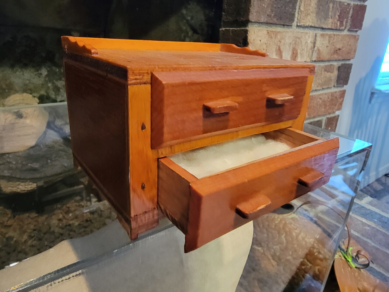 Miniature chest of drawers.
