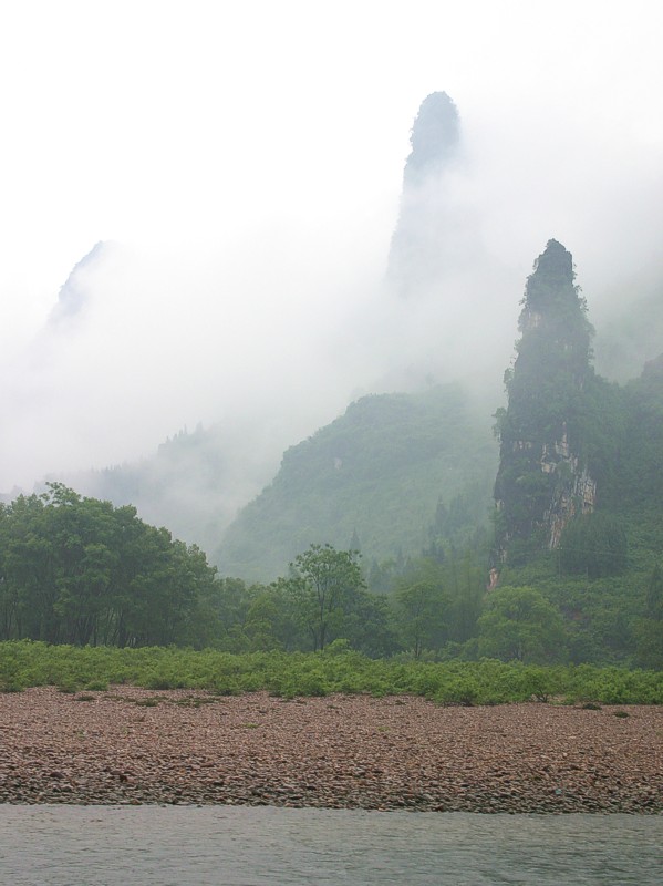 Limestone peaks through early morning fog